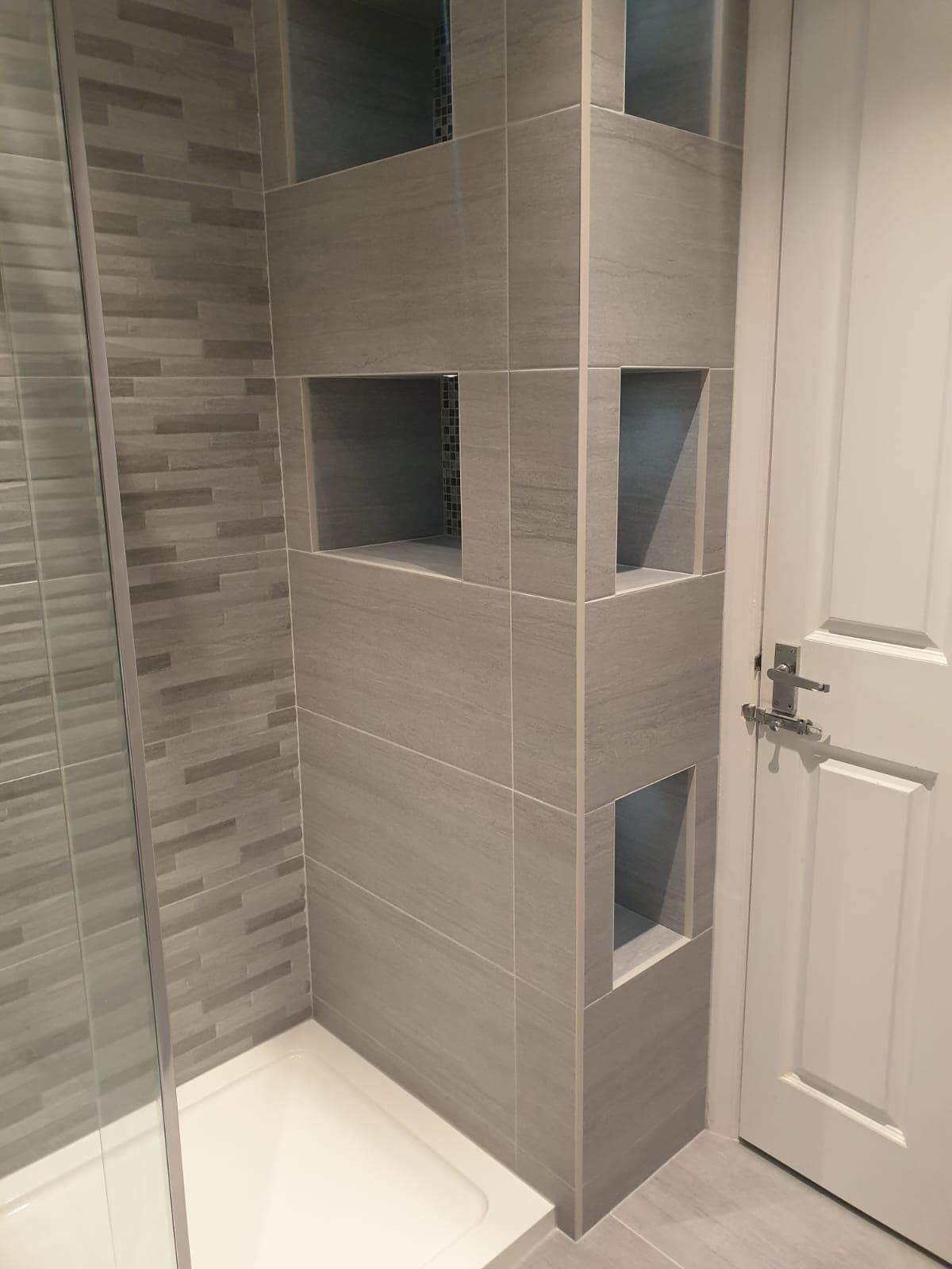 Bathroom upgrade with vanity unit and mirror fitting